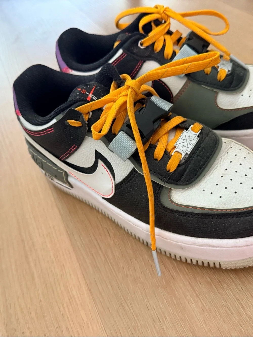Nike White and Black Sneakers with Yellow Laces